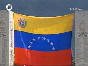 Bandera de Ch�vez. Est� feliz el hombre, le est�n haciendo la mega jalada.